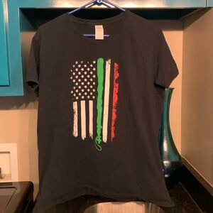 An L T-shirt with American flag logo with Irish heritage colors.
